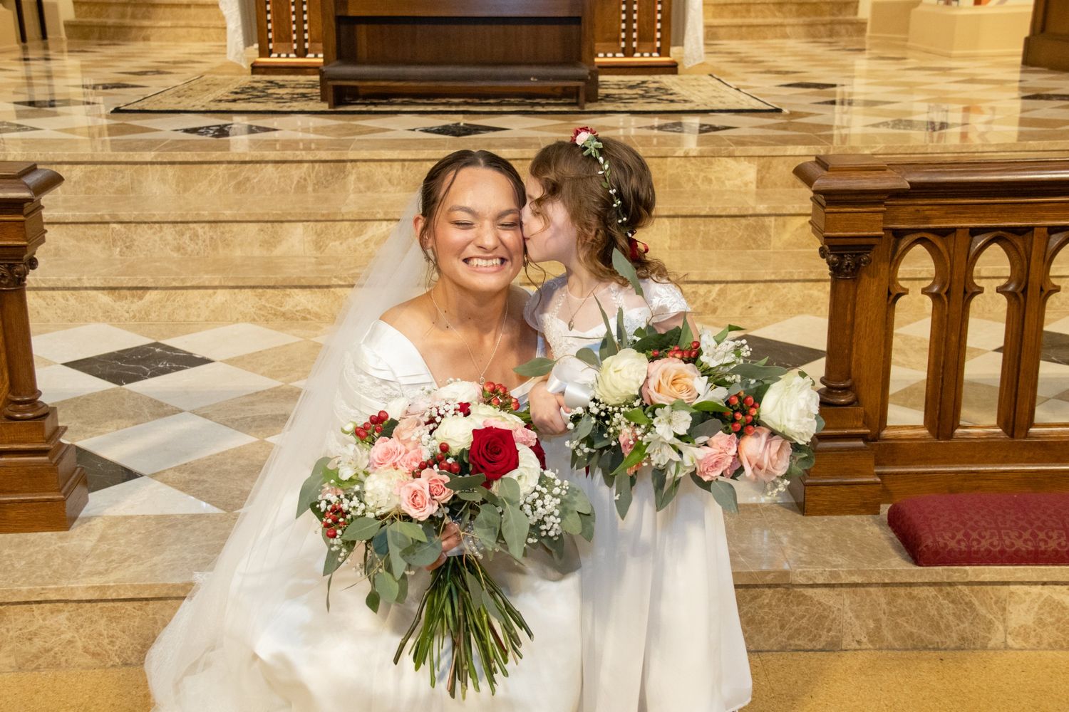 Bridal and flower girl bouquets in blush, cream and red