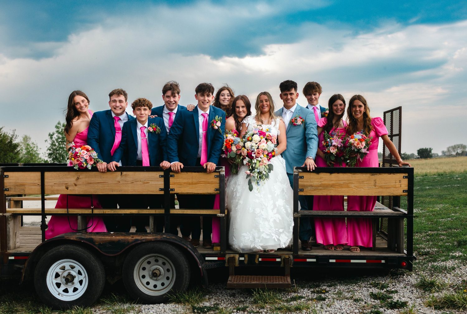 Bouquets and boutonnieres for a pink and navy bridal party